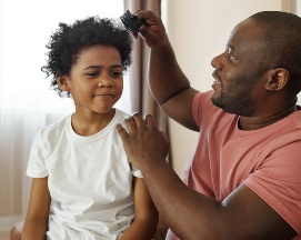 A picture of a child being cared for by their volunteer guardian